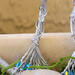 close up of glass bead wire wrapped tree trunk